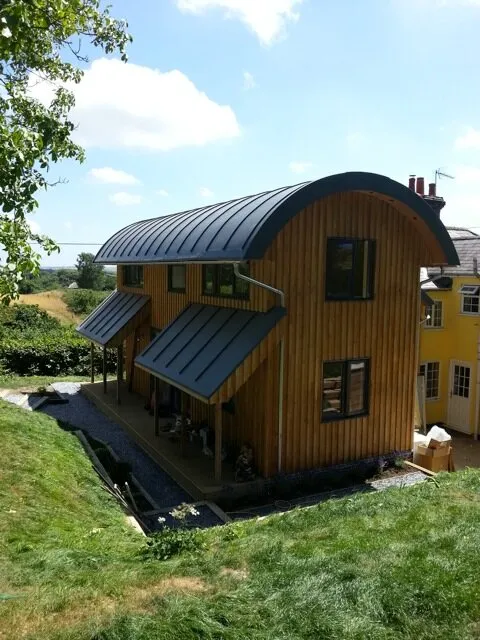 Curved barrel roof finished in single ply membrane